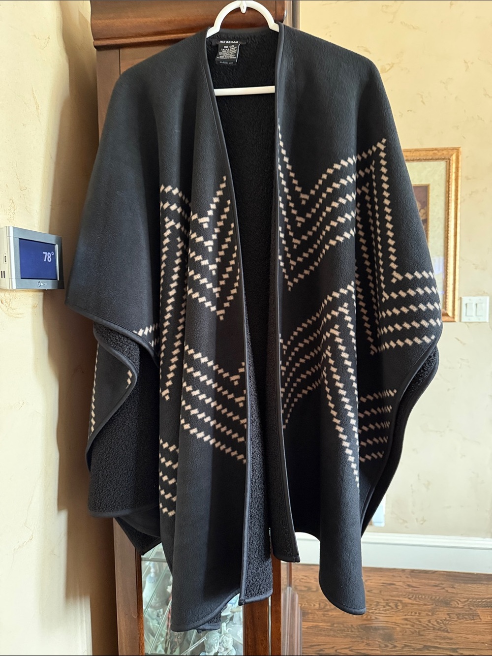Ike Behar Black Cape with Cream Geometric Pattern. New- Never worn. Reversible